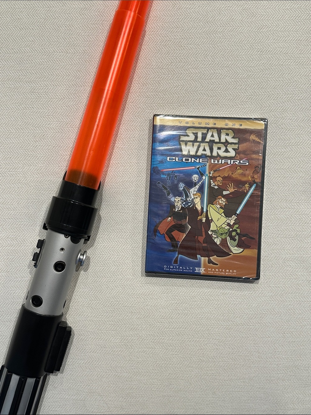 Star Wars Orange and Silver Lightsaber with Clone Wars DVD